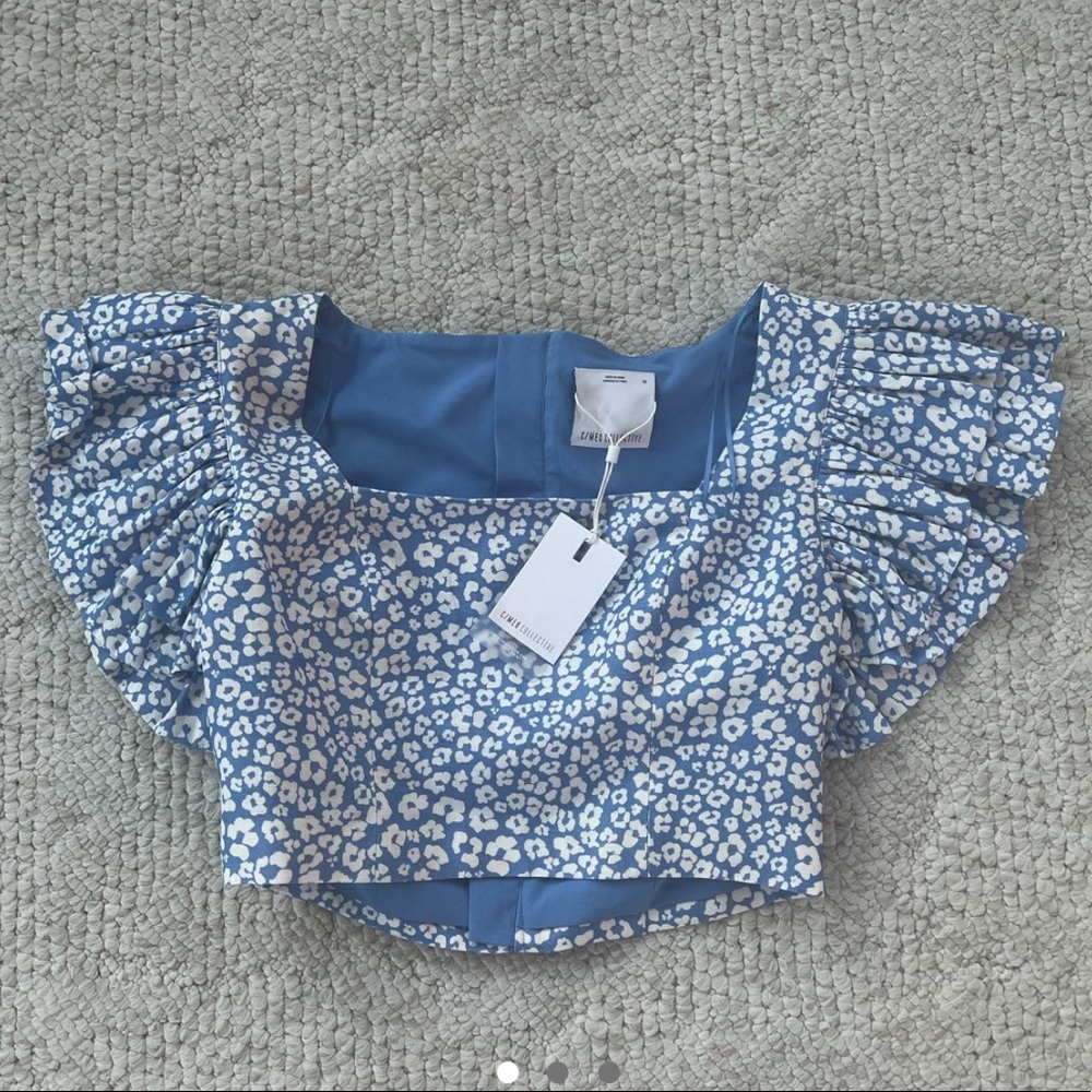 C/MEO Collective Blue ruffle shirt

Never worn- NWT!